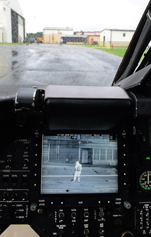 Jose Mejia, Aviation Development Directorate photographer, is displayed on an imaging monitor in the OH-58D “Kiowa Warrior” before its final flight at Joint Base Langley-Eustis, Va., Sept. 18, 2017.