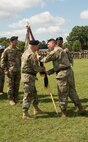 (Left) Incoming Commander of the 80th Training Command Maj. Gen. Bruce E. Hackett receives the unit's colors from Deputy Commanding General of the U.S. Army Reserve Command Maj. Gen. Scottie D. Carpenter at the 80th's change of command ceremony at Fort Lee, Virginia, Sept. 17, 2017.