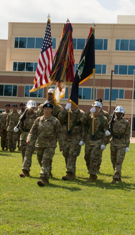 80th Training Command Chief of Staff Col. Suzie Kuilan leads the unit's color guard in the 80th's change of command ceremony at Fort Lee, Virginia, Sept. 17, 2017.