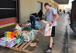 Capt. Gary E. Miller, of U.S. Army 5th Medical Recruiting Battalion, unloads supplies Sept. 2 at the American Red Cross in San Antonio. He collected and delivered approximately 1,500 pounds of donated food, water and supplies and delivered them to for Hurricane Harvey relief efforts.