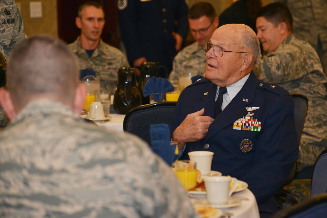 U.S. Air Force Retired Brig. Gen. Richard Abel listens to his wingman speak during a POW/MIA Recognition Day breakfast at Joint Base Langley-Eustis, Va., Sept. 15, 2017.