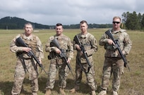 Members of the 416th Theater Engineer Command Marksmanship Team, show their M-16A2 rifle as they begin to compete in the 2017 Army Reserve Small Arms Championship.