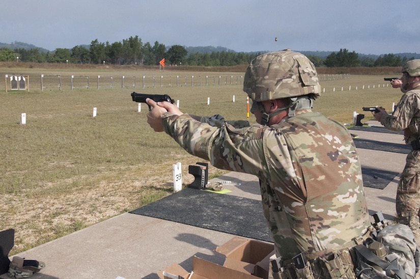 Sgt. John Halley, from Winslow, Arkansas, a combat engineer with the 688th Engineer Company (Mobility Augmentation Company), Harrison, Arkansas, competes during the M-9 portion of the Army Reserve Small Arms Championship.
