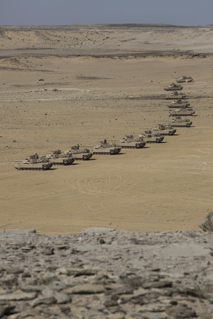 A column of U.S. Army M1A2 Abrams tanks from the 2nd Battalion, 7th Cavalry Regiment, 3rd Armored Combat Team, 1st Cavalry Division, await the star of the final combined arms live fire exercise of Bright Star 2017. Exercise Bright Star 2017 is a bilateral U.S. Central Command command-post exercise, field training exercise and senior leader seminar, held with the Arab Republic of Egypt. Participation strengthens military-to-military relationships between U.S. and Egyptian forces in the Central Command area of responsibility. The exercise enhances regional security and stability by responding to modern-day security scenarios. (U.S. Department of Defense photo by Tom Gagnier)