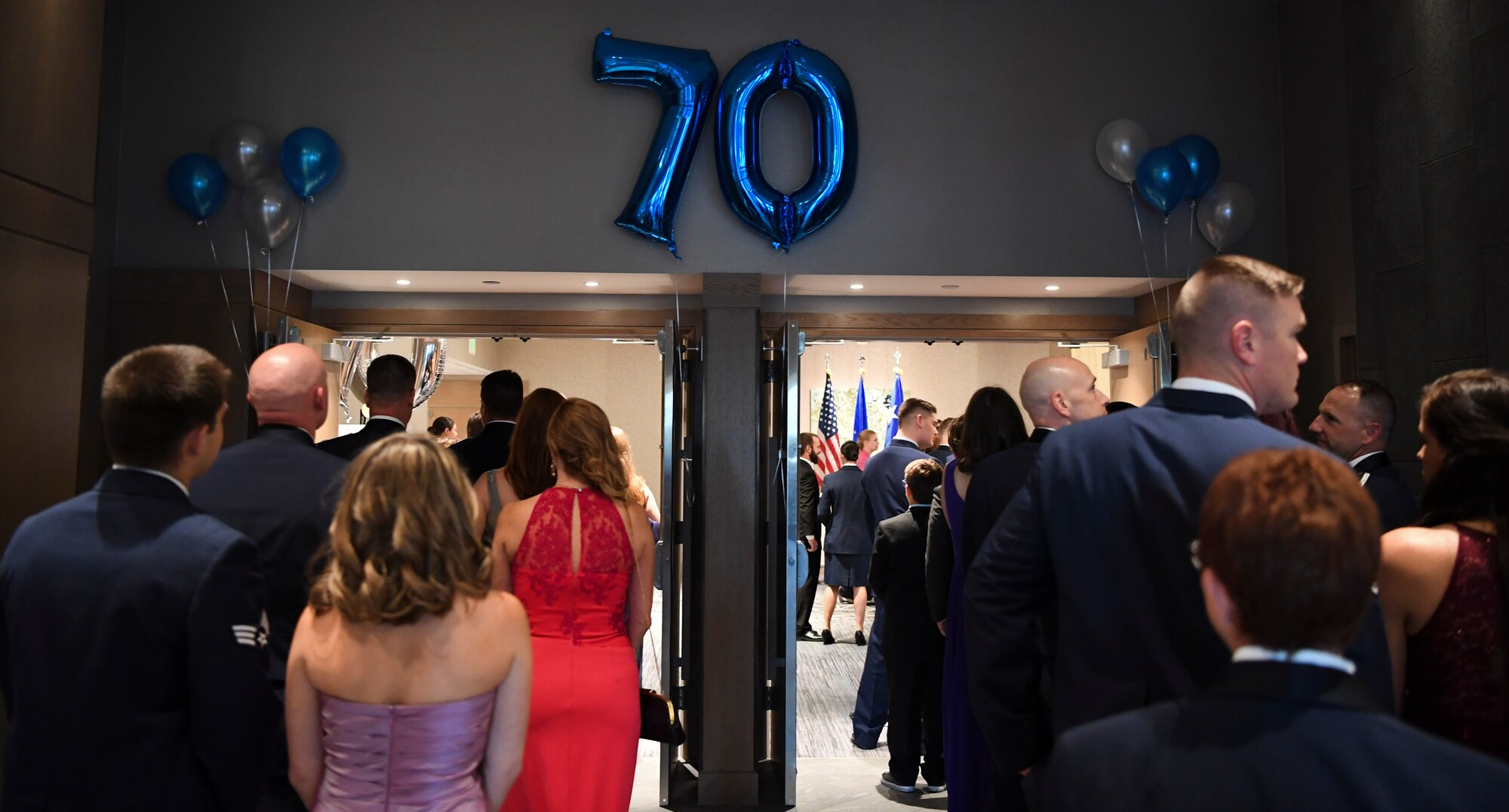 Buckley members and their spouses gathered in celebration of the 70th anniversary of the U.S. Air Force becoming its own branch of service. (U.S. Air Force photo by Airman 1st Class Holden S. Faul/ Released)