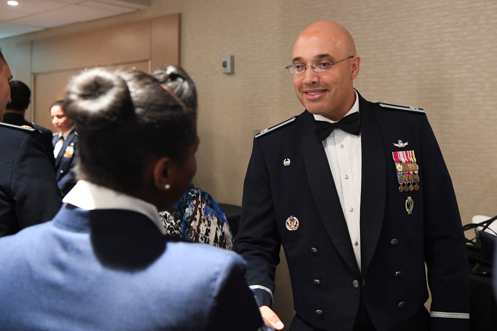 Buckley members and their spouses gathered in celebration of the 70th anniversary of the U.S. Air Force becoming its own branch of service. (U.S. Air Force photo by Airman 1st Class Holden S. Faul/ Released)