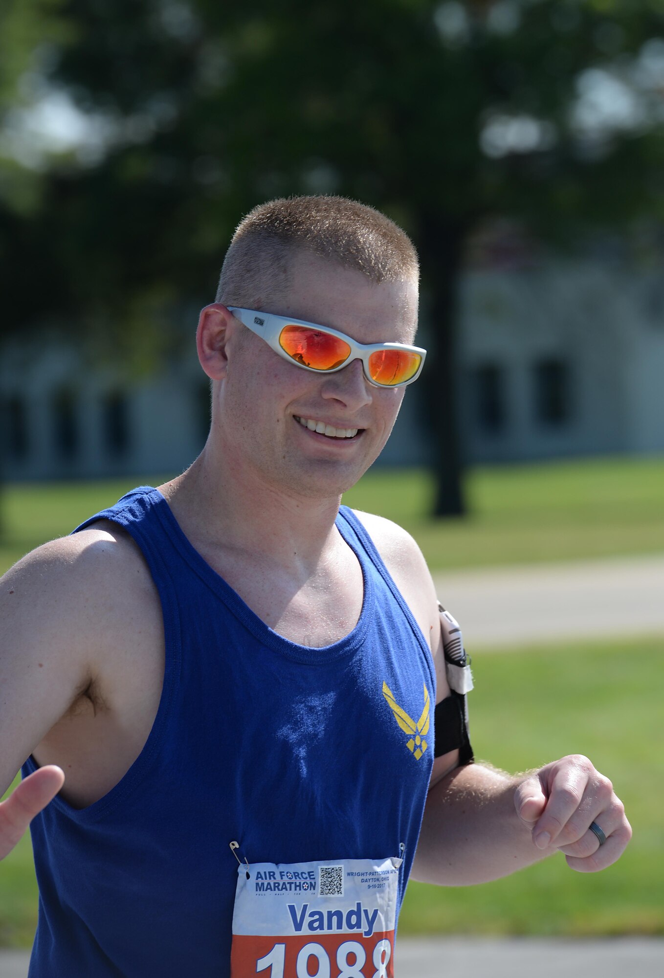 Capt. John Vandervoort, 41st Flying Training Wing Executive Officer, runs the last mile of the Air Force Marathon Sept. 16, 2017, on Wright-Patterson Air Force Base, Ohio. Vandervoort had the fastest time of all the Team BLAZE members who ran the Air Force Marathon, with a time of 4:24:08. (U.S. Air Force photo by Airman 1st Class Keith Holcomb)