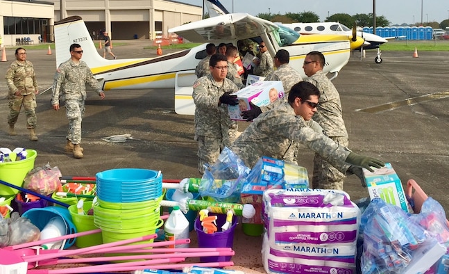 Reserve Airmen from the 340th Flying Training Group’s 70th Flying Training Squadron at the Air Force Academy, Colorado Springs, Colo. load more than 600 pounds of relief supplies to deliver to citizens in Beaumont, Texas after Hurricane Harvey. (Courtesy photo).