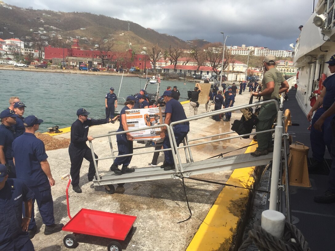 The Coast Guard Cutter Joseph Tezanos crew offloads supplies, equipment and emergency personnel to assist the residence of St. Thomas, U.S. Virgin Islands after Hurricane Irma, Sunday, Sept. 10, 2017.