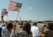 Family members wave American flags as a group of C-130H3 Hercules taxied into place on the flightline at Dobbins Air Reserve Base, Ga. Sept. 18, 2017. The aircrews were returning to Dobbins after a four-month deployment to the Middle East in support of contingency operations. (U.S. Air Force photo/Staff Sgt. Andrew Park)