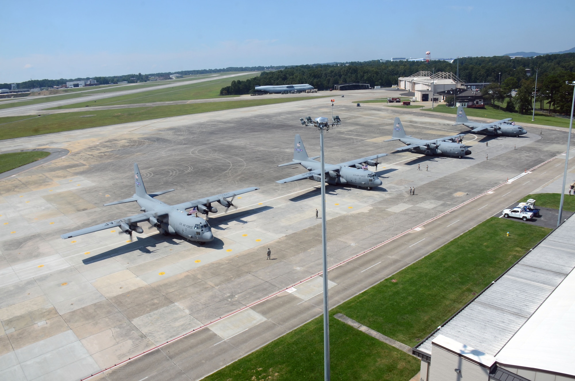 A group of C-130H3 Hercules are parked on the flightline at Dobbins Air Reserve Base, Ga. Sept. 18, 2017. The aircrews were returning to Dobbins after a four-month deployment to the Middle East in support of contingency operations. (U.S. Air Force photo/Don Peek)