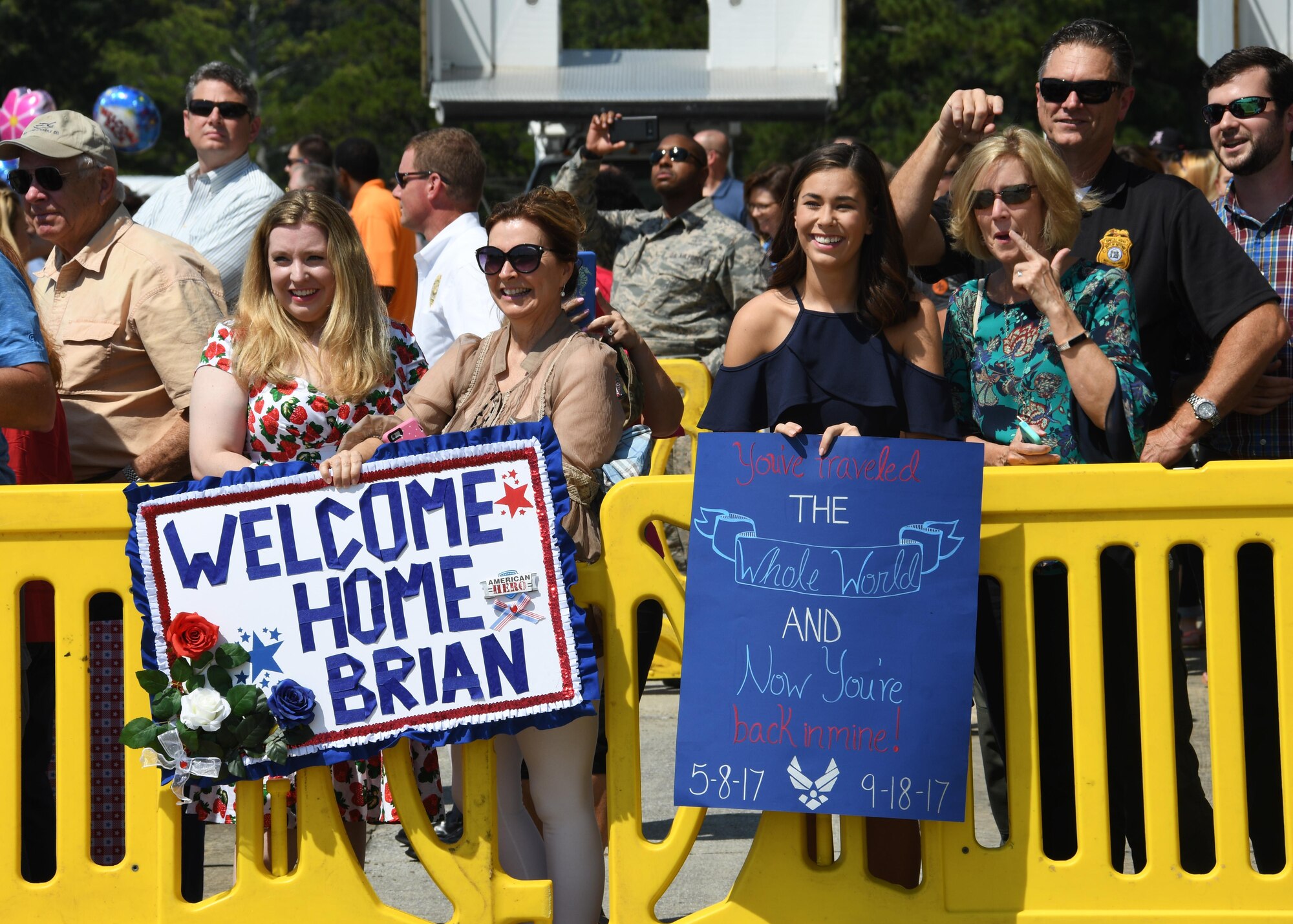 Families and friends of returning deployers prepare to greet their loved ones at Dobbins Air Reserve Base, Ga. Sept. 18, 2017. Four aircraft, along with their aircrews, returned to the 94th Airlift Wing after a deployment to Al Udeid Air Base, Qatar. (U.S. Air Force photo by Staff Sgt. Miles Wilson)