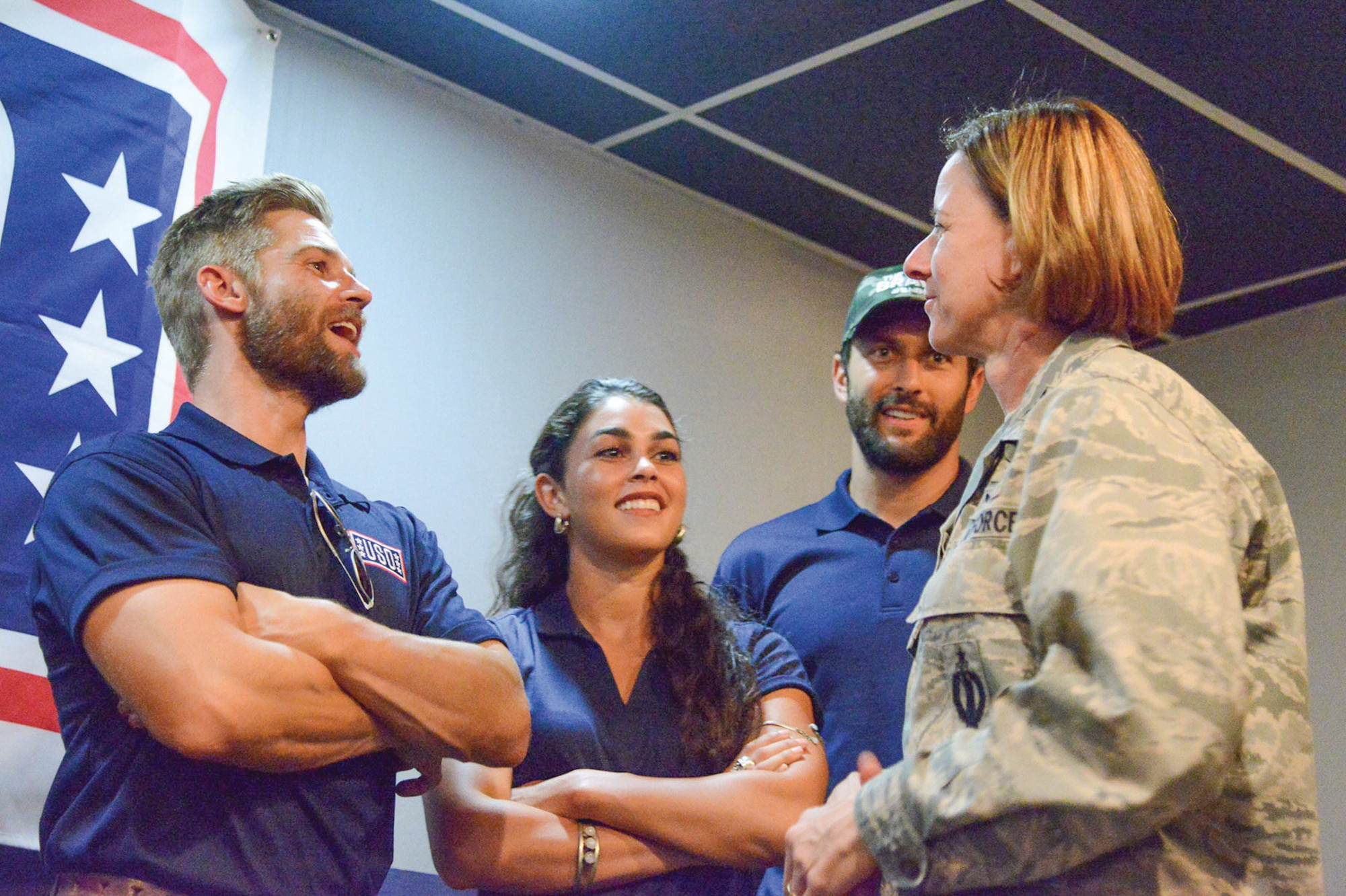 From left, “The Brave” cast members Mike Vogel, Natacha Karam and Noah Mills speak with 377th Air Base Wing Vice Commander Col. Dawn Nickell on Sept. 8 at the Mountain View Club.