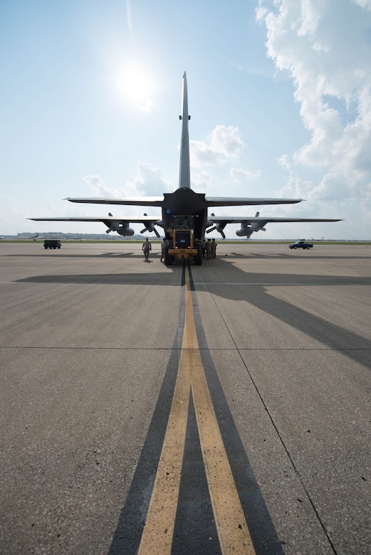 Airmen from the 123rd Airlift Wing load equipment and vehicles onto a C-130 Hercules aircraft at the Kentucky Air National Guard Base in Louisville, Ky., Sept. 20, 2017. The cargo will be used by members of the 123rd Special Tactics Squadron, who deployed to the Caribbean on Sept. 20 to conduct relief operations in the wake of Hurricane Maria.