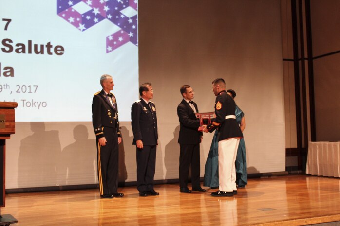 US Marine exceeds expectations, accepts award