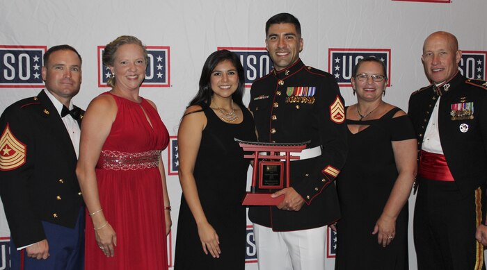 US Marine exceeds expectations, accepts award