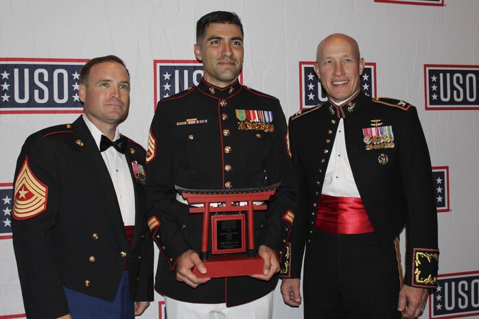 US Marine exceeds expectations, accepts award