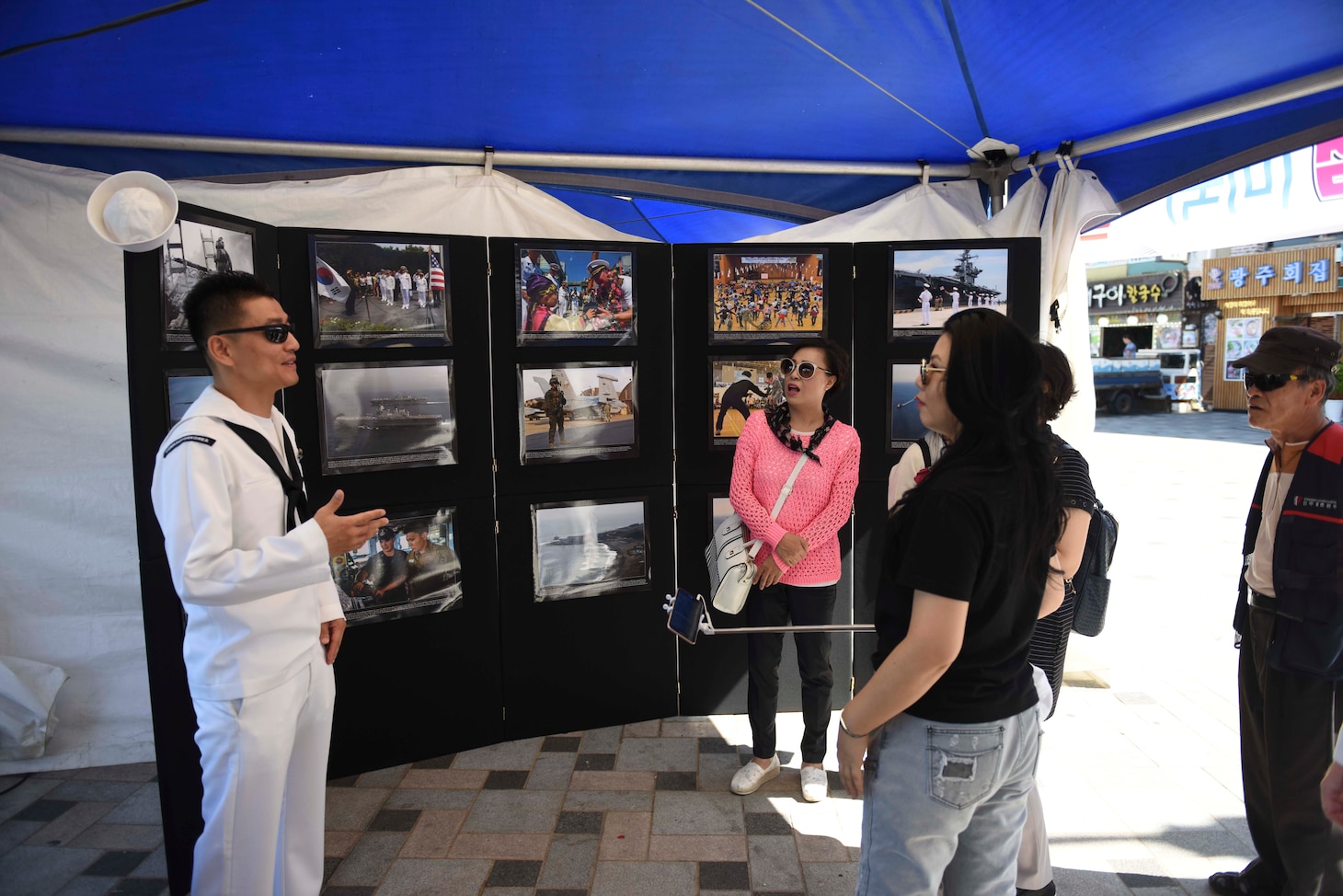 Sailors participate in a community outreach event at the 67th Incheon Landing Operations Commemoration Ceremony.  Incheon landing was a combined U.S. and ROK military assault during the Korean War is considered one of the most significant and successful operations in the history of amphibious warfare.
