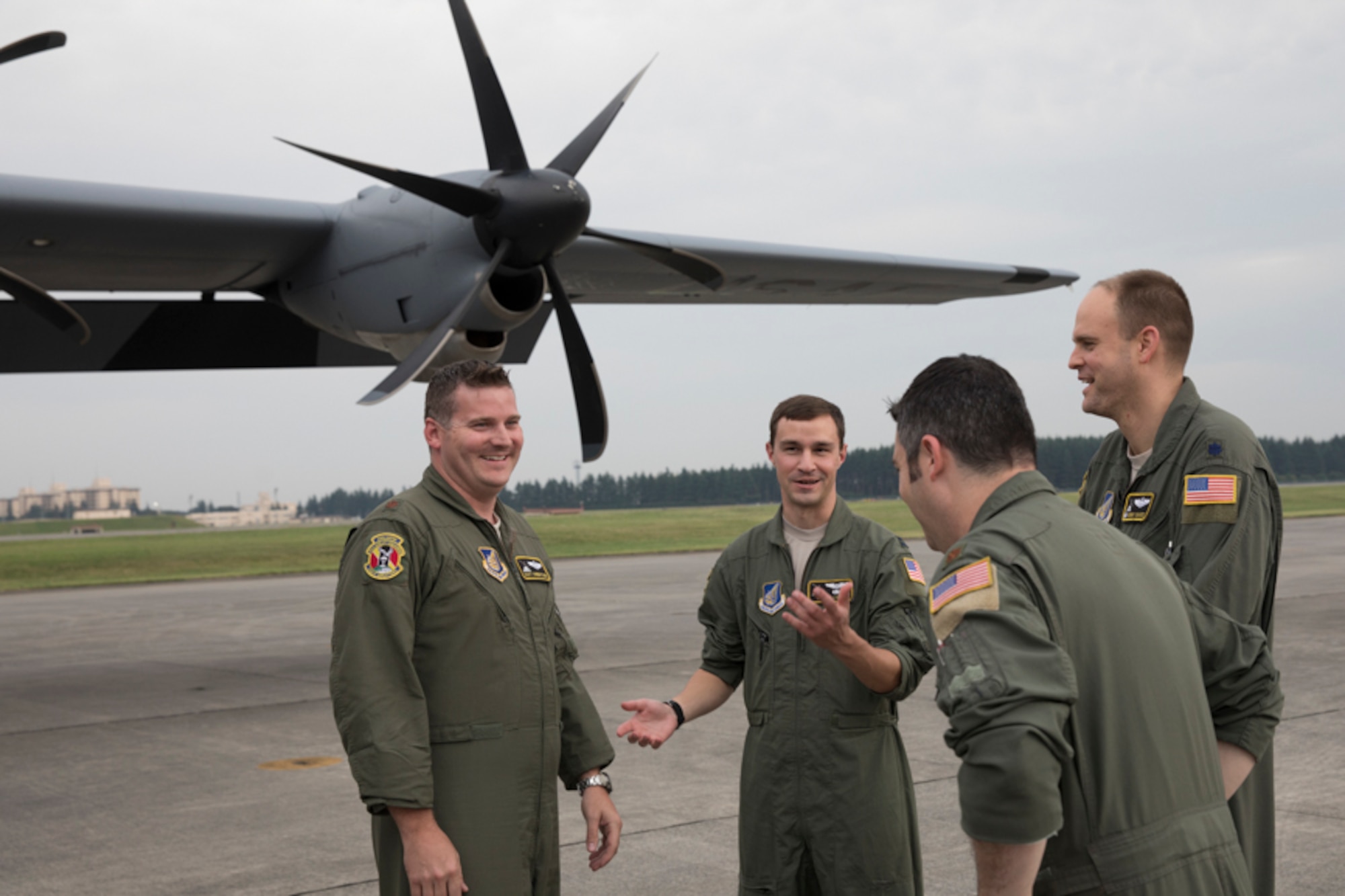 Crewmembers with the 36th Airlift Squadron talks after landing at Yokota