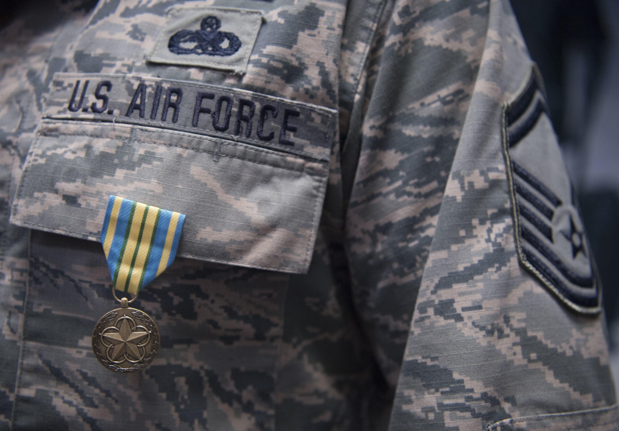 U.S. Air Force Senior Master Sgt. Kevan Williams, a safety technician with the 130th Airlift Wing, stands with his newly pinned Military Outstanding Volunteer Service Medal Sept. 16, 2017.