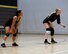 Gabby Ransom, left, 86th Force Support Squadron bartender, and Ashley Henriques, Ramstein High School Varsity Volleyball Team coach, prepare to receive a serve during tryouts at the Southside Fitness Center on Ramstein Air Base, Germany, Sept. 14, 2017.