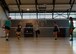 Athletes from the Kaiserslautern Military Community stretch before volleyball tryouts at the Southside Fitness Center on Ramstein Air Base, Germany, Sept. 12, 2017.