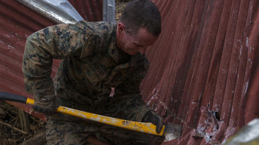 U.S. Marines, Sailors with the 26th MEU conduct relief work on Saint John