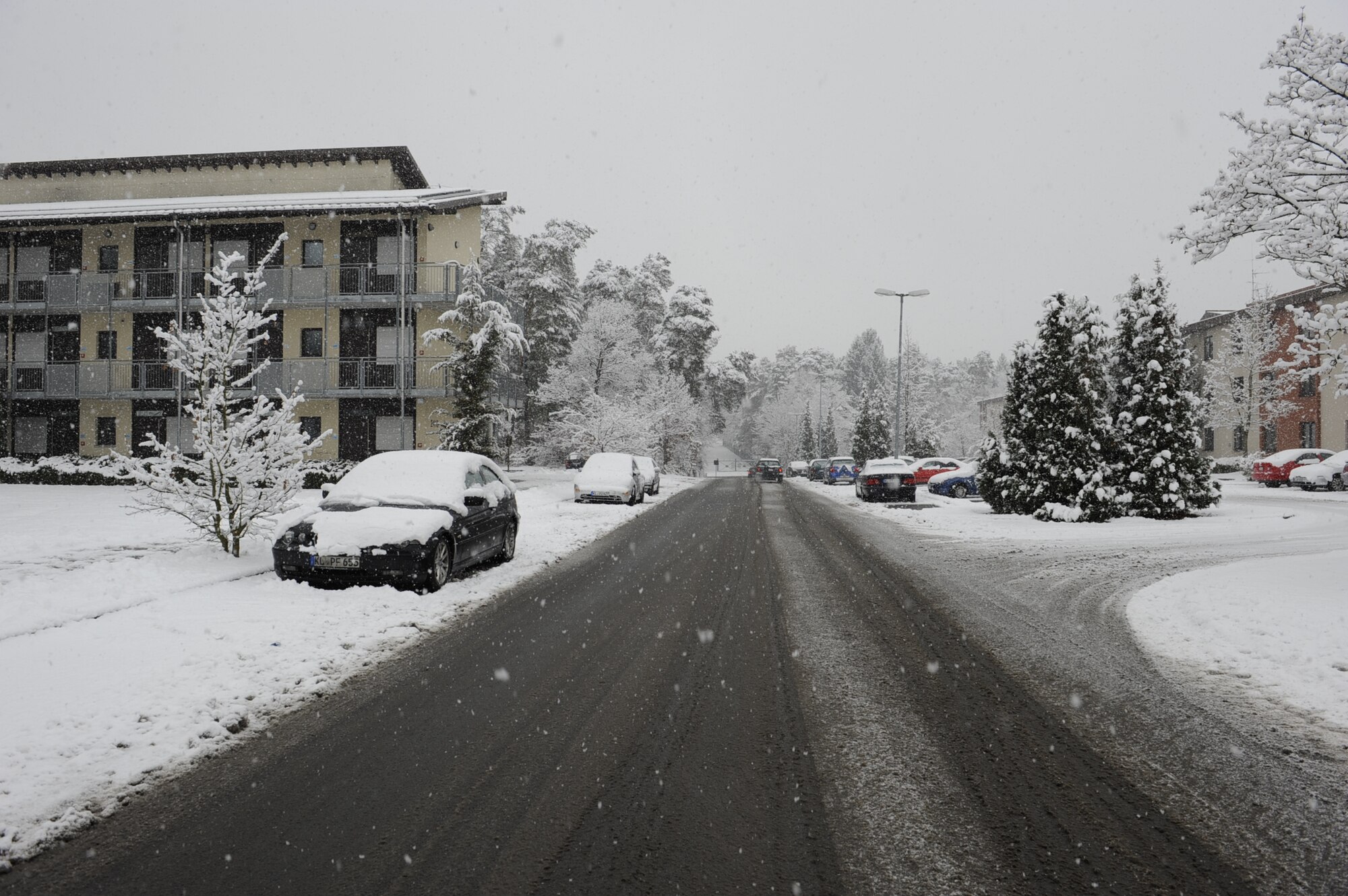 Snow falls on Ramstein Air Base, Germany, Jan. 10, 2017. As winter slowly approaches, frost will begin to appear on windshields, and drivers may be cited for ice or snow on car roofs, windows, or hoods, and may even be denied access to the base. Drivers are expected to properly clear all frost and ice from windows and lights before driving, and to exercise responsible driving.