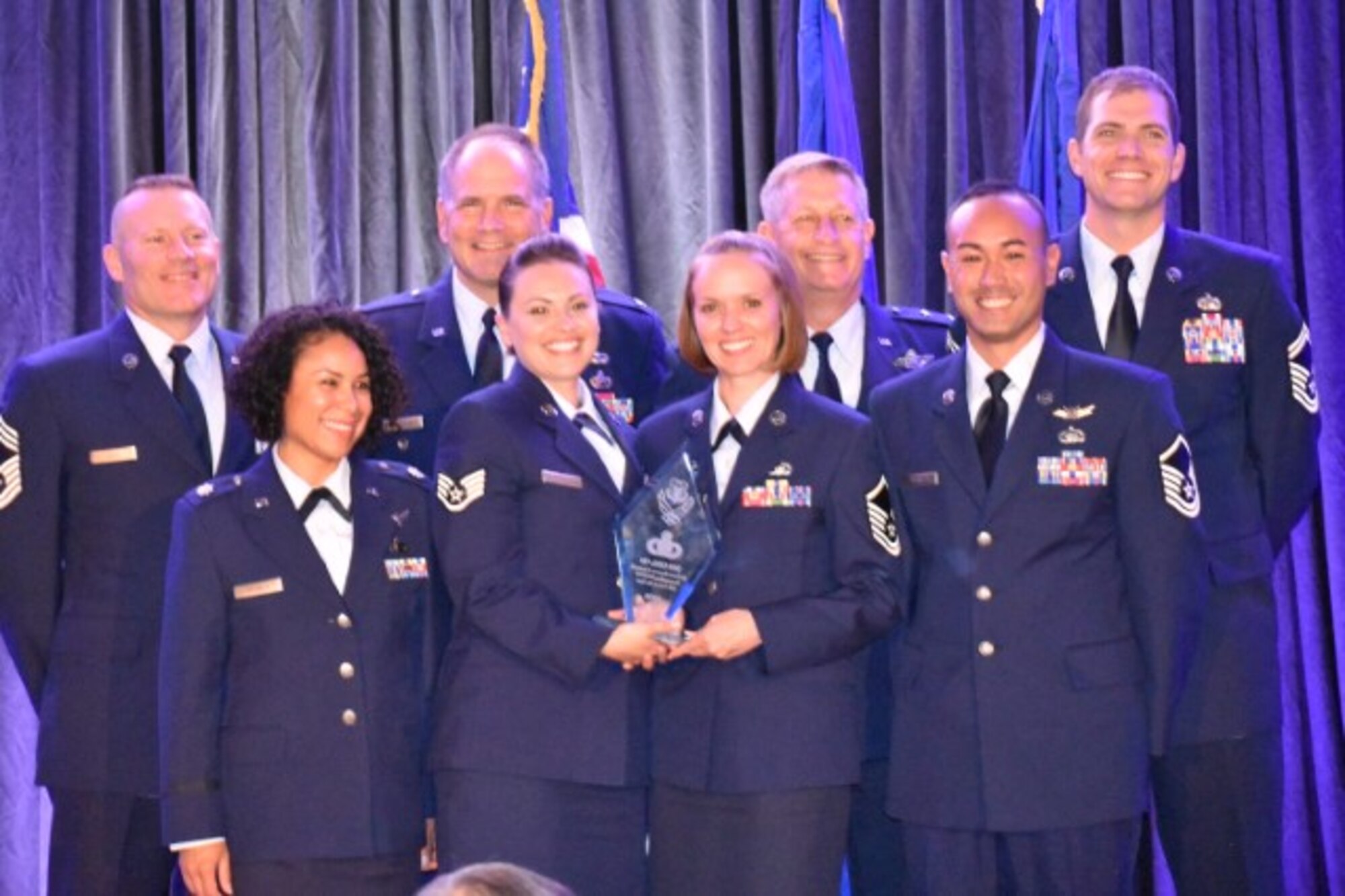 Reserve Citizen Airmen from the 310th Space Wing were awarded the 2016 Outstanding Air Reserve Component Operations Group Intelligence/Operations Support Squadron Unit of the Year in recognition of the excellent contributions of the wing's intelligence personnel at a banquet in San Antonio, TX, Aug. 16, 2017.
