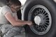 Airman 1st Class Dominick Castro, 92nd Aircraft Maintenance Squadron crew chief, refills a tire on a KC-135 Stratotanker with nitrogen at Fairchild Air Force Base, Washington, Sept. 11, 2017. The KC-135 is an aerial refueling platform capable of delivering more than 200,000 pounds of fuel to U.S. and allied nation aircraft globally at a moment's notice. (U.S. Air Force photo by Airman 1st Class Ryan Lackey)