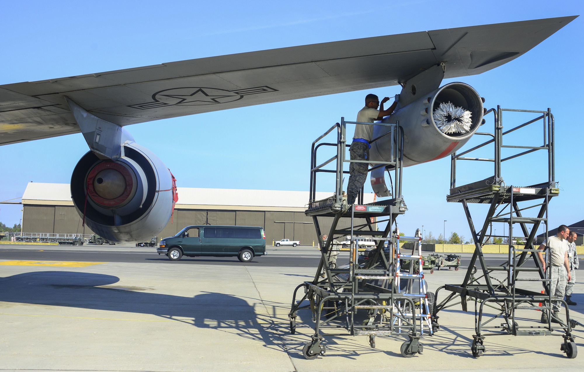Airman 1st Class Kwame Edwards, 92nd Maintenance Squadron crew chief, takes off panels and lines from a KC-135 Stratotanker multi-point refueling system pod during an exercise Sept. 11, 2017, at Fairchild Air Force Base, Washington. The KC-135 is an aerial refueling platform capable of delivering more than 200,000 pounds of fuel to U.S. and allied nation aircraft globally at a moment's notice. (U.S. Air Force photo/Senior Airman Janelle Patiño)