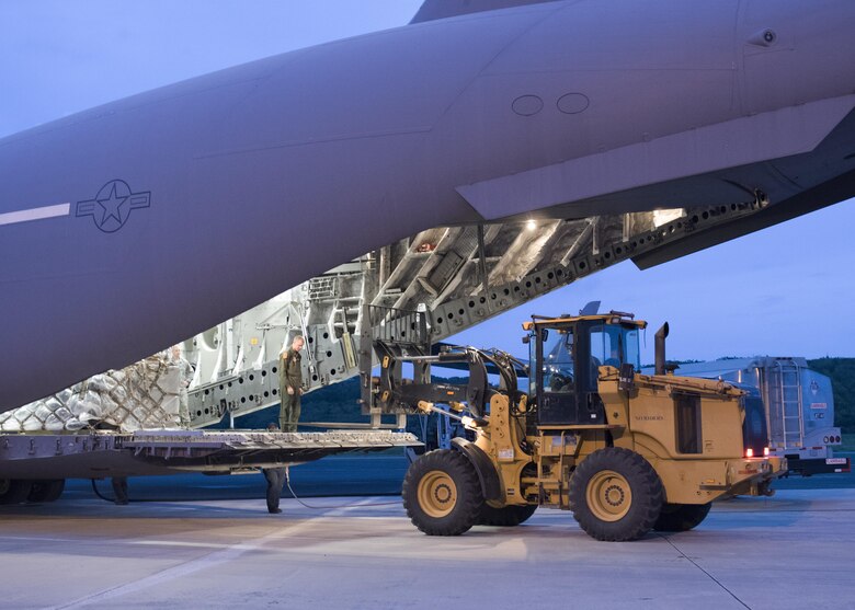 A U.S. Air Force C17 Globemaster from Travis AFB, CA unloads medical equipment and personnel from the 60th Medical Group on the island of St. Croix Sept. 8, 2017. The 60th MDG will provide aeromedical evacuation and emergency medical care to victims of hurricane Irma in the U.S. Virgin Islands. (DoD Photo by: USAF Capt. Lauren Hill / Release