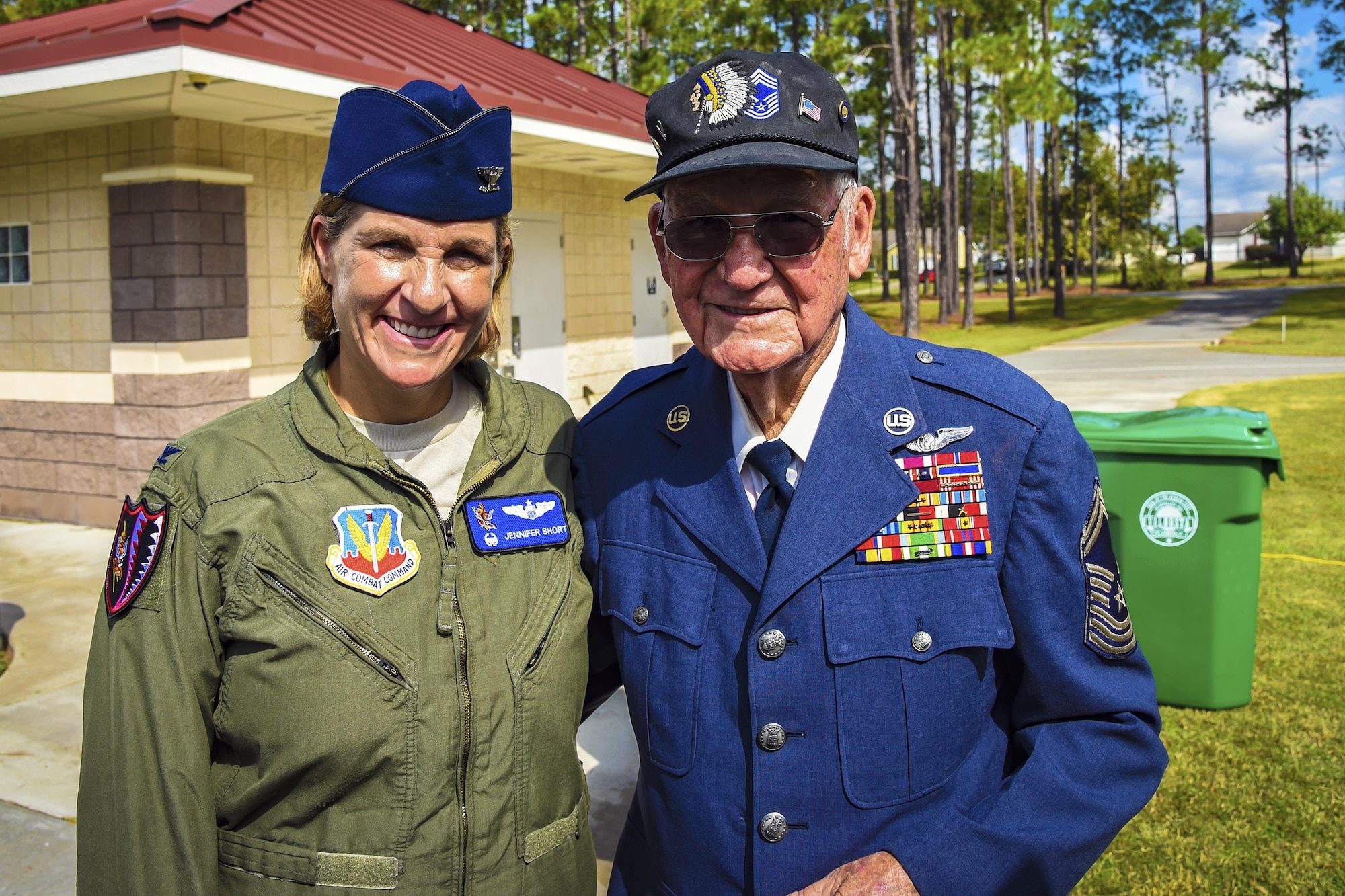 U.S. Air Force Col. Jennifer Short, 23d Wing commander, left, and retired Chief Master Sgt. Jim E. Harring pose for a photo during an U.S. Air Force 70th birthday celebration, Sept. 16, 2017, in Valdosta, Ga. Harring was a charter member of the Air Force, who first enlisted in the Army Air Corps on Jan. 8, 1947 and served in the military for over 30 years. (U.S. Air Force photo by Airman Eugene Oliver)