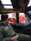 Lt. Col. John P. Booker, the 343rd Bomb Squadron Commander, interacts with visitors from the pilot seat of a B-52 Stratofortress during the NATO Days 2017 Air Show in Ostrava, Czech Republic, Sept. 17, 2017.