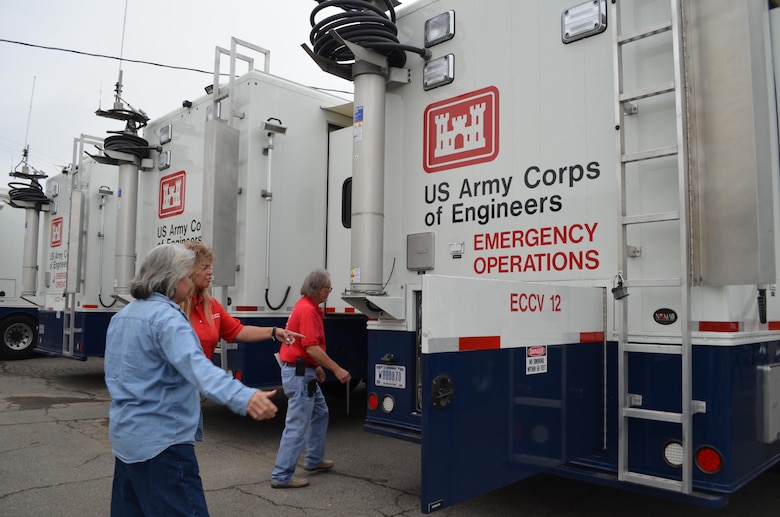 Custodial District Support Team members inspect Emergency Command and Control Vehicles (ECCVs) during a three-day simulation exercise held at Black Butte Lake near Orland, California in mid-November. This all-volunteer team is composed of U.S. Army Corps of Engineers employees who deploy to significant man-made and natural disaster sites and provide a platform for critical operations and communications.