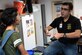 Capt. Victor, 17th Attack Squadron MQ-9 Reaper pilot, teaches robotics students as a volunteer mentor Sept. 7, 2017, in Las Vegas.