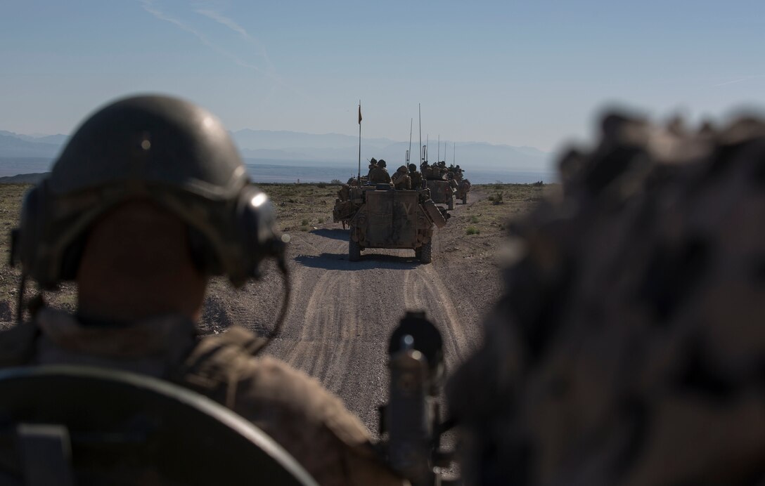 Marines with 3rd Light Armored Reconnaissance Battalion, 1st Marine Division, prepare for an assault during part of the Battalion’s Marine Corps' Combat Readiness Evaluation at Marine Corps Air Ground Combat Center Twentynine Palms, Calif., Mar. 13, 2017. 3rd LAR conducted a two part MCCRE to evaluate the combat readiness of D Co. (Marine Corps photo by Lance Cpl. Mike Hernandez)