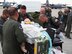 The 934th Airlift Wing Critical Care Air Transport Team trains with a Sim-Man aboard a C-130 aircraft Sept. 10. (Air Force Photo/Paul Zadach)