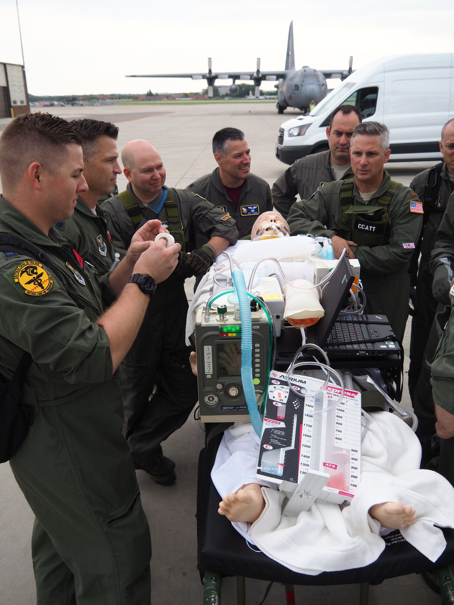 The 934th Airlift Wing Critical Care Air Transport Team trains with a Sim-Man aboard a C-130 aircraft Sept. 10. (Air Force Photo/Paul Zadach)