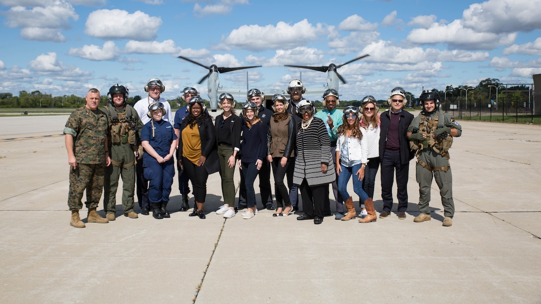 Local dignitaries from Detroit, pose for a photo after the MV-22 Osprey flights over Detroit as part of Marine Week, Sept. 6, 2017. Marine Week Detroit is an opportunity to connect with the people of the greater Detroit area, and thank them for their support.