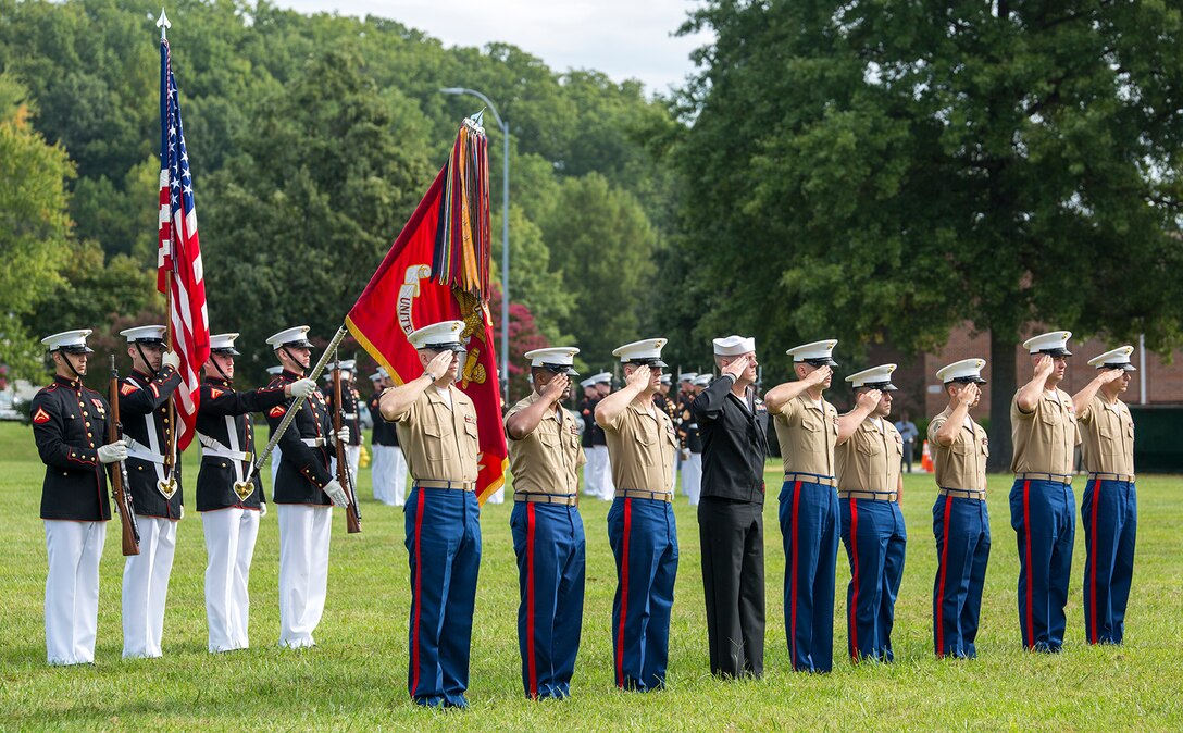 Marine Corps enlisted awardees render a salute during the Enlisted Awards Parade at the Modern Day Marine Military Exposition (MDMME) at Lejeune Field, Marine Corps Base Quantico, Quantico, Va., Sept. 20, 2017. The MDMME is an annual exposition open to the public to display the progression of equipment and technology that is currently employed and may be utilized with future Marine Corps operating forces. (Official U.S. Marine Corps photo by Cpl. Robert Knapp/Released)