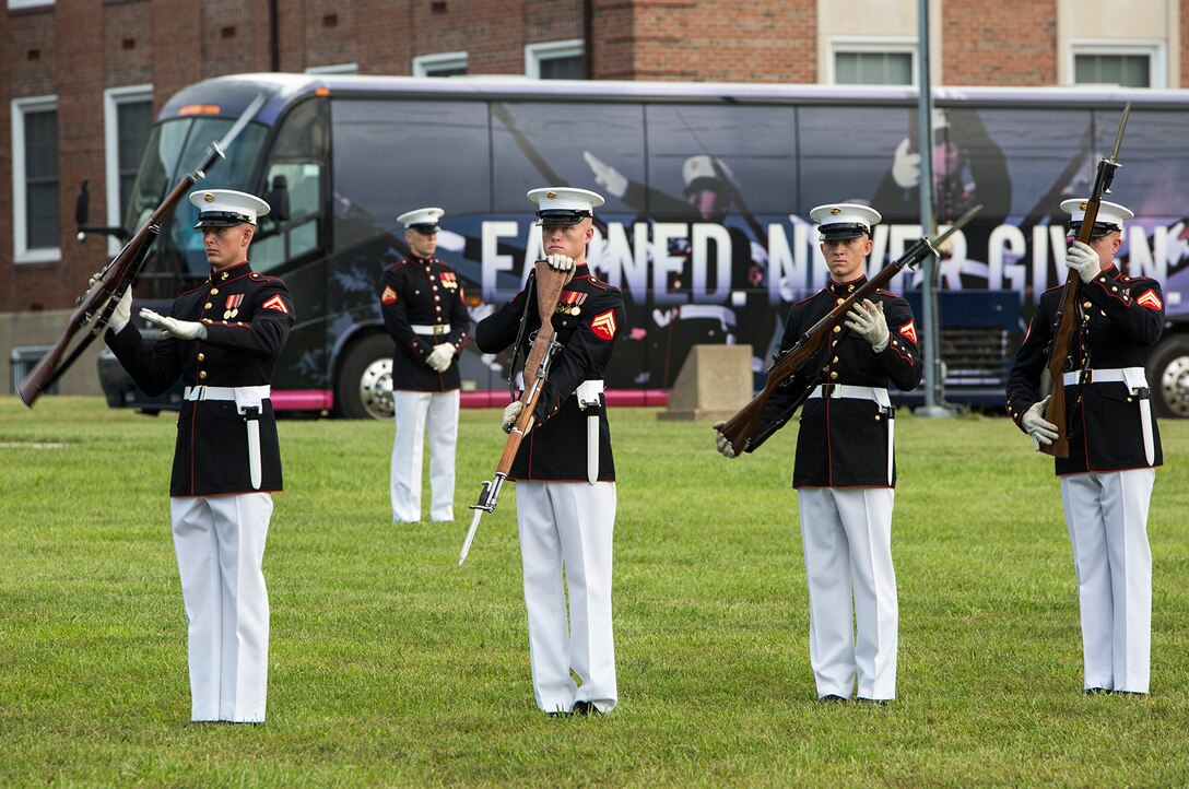 Marines of the U.S. Marine Corps Silent Drill Platoon execute precision rifle drill movements during the Enlisted Awards Parade at the Modern Day Marine Military Exposition (MDMME) at Lejeune Field, Marine Corps Base Quantico, Quantico, Va., Sept. 20, 2017. The MDMME is an annual exposition open to the public to display the progression of equipment and technology that is currently employed and may be utilized with future Marine Corps operating forces. (Official U.S. Marine Corps photo by Cpl. Robert Knapp/Released)