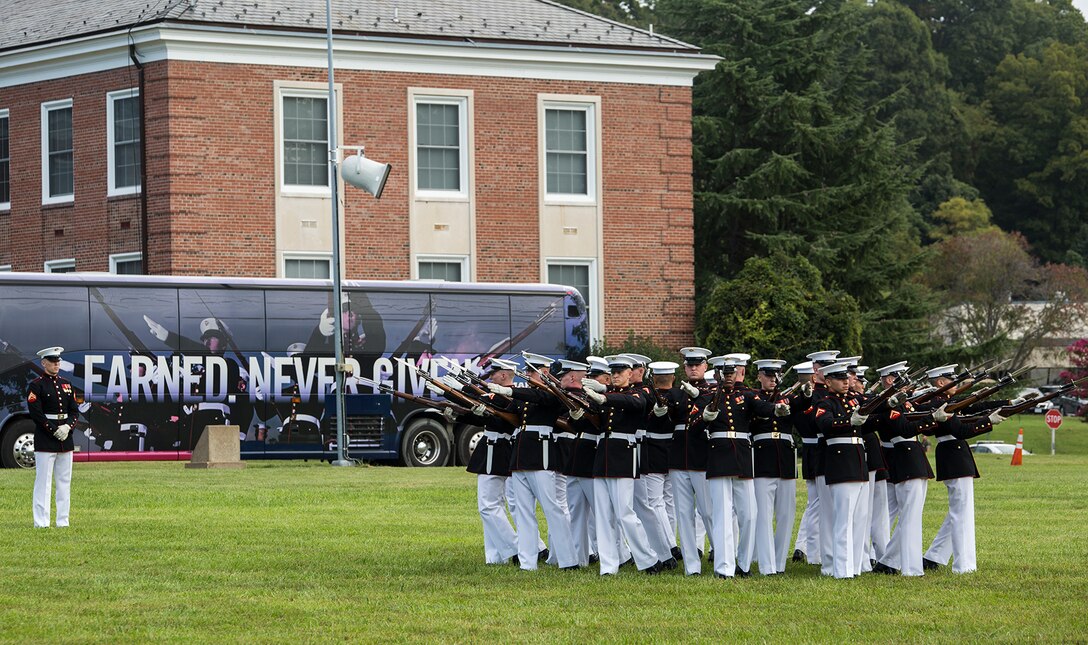 Marines of the U.S. Marine Corps Silent Drill Platoon execute their “bursting bomb” sequence during the Enlisted Awards Parade at the Modern Day Marine Military Exposition (MDMME) at Lejeune Field, Marine Corps Base Quantico, Quantico, Va., Sept. 20, 2017. The MDMME is an annual exposition open to the public to display the progression of equipment and technology that is currently employed and may be utilized with future Marine Corps operating forces. (Official U.S. Marine Corps photo by Cpl. Robert Knapp/Released)
