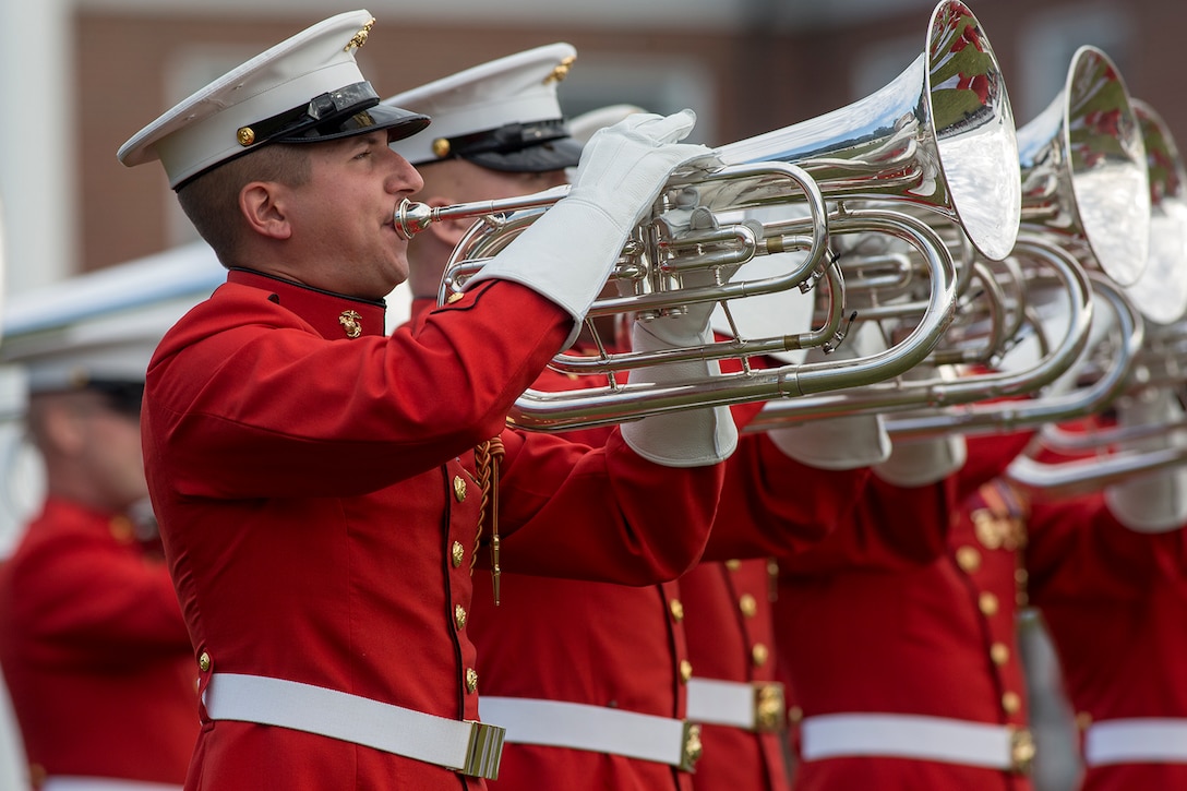 Marines with “The Commandant’s Own” U.S. Marine Drum & Bugle Corps play musical ballads during the Enlisted Awards Parade at the Modern Day Marine Military Exposition (MDMME) at Lejeune Field, Marine Corps Base Quantico, Quantico, Va., Sept. 20, 2017. The MDMME is an annual exposition open to the public to display the progression of equipment and technology that is currently employed and may be utilized with future Marine Corps operating forces. (Official U.S. Marine Corps photo by Cpl. Robert Knapp/Released)