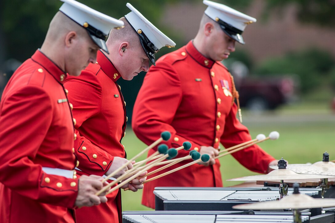 Marines with “The Commandant’s Own” U.S. Marine Drum & Bugle Corps play musical ballads during the Enlisted Awards Parade at the Modern Day Marine Military Exposition (MDMME) at Lejeune Field, Marine Corps Base Quantico, Quantico, Va., Sept. 20, 2017. The MDMME is an annual exposition open to the public to display the progression of equipment and technology that is currently employed and may be utilized with future Marine Corps operating forces. (Official U.S. Marine Corps photo by Cpl. Robert Knapp/Released)
