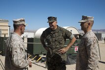 Lt. Gen. Daniel O’Donohue, center, 1st Marine Division Commanding General, is greeted by Maj. Gen. John K. Love, right, 2nd Marine Division Commanding General , and Col. James McDonough, 10th Marine Regiment Commanding Officer, upon arrival during Large Scale Exercise-17 in Twentynine Palms, Calif., Aug. 15, 2017. LSE-17 is a multinational exercise, led by 2nd Marine Division, with elements from the United Kingdom, France, Canada and II Marine Expeditionary Force, focused on integrating all capabilities of the Marine Air-Ground Task Force and coalition forces. (U.S. Marine Corps photo by Lance Cpl. Holly Pernell)