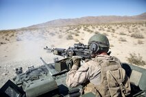 A U.S. Marine with 3rd Light Armored Reconnaissance Battalion, Regimental Combat Team-8, fires an M240B medium machine gun from a light armored vehicle during Large Scale Exercise-17 at Twentynine Palms, Calif., Aug. 18, 2017. LSE-17 is a multinational exercise, led by 2nd Marine Division, with elements from the United Kingdom, France, Canada and II Marine Expeditionary Force, focused on integrating all capabilities of the Marine Air-Ground Task Force and coalition forces. (U.S. Marine Corps photo by Lance Cpl. Holly Pernell)