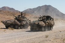 U.S. Marines with Apache Company, 3rd Light Armored Reconnaissance Battalion, Marine Air-Ground Task Force-8 (MAGTF), maneuver to their attack position in support of the final exercise during Integrated Training Exercise 5-17 (ITX), on Marine Corps Air Ground Combat Center Twentynine Palms, Calif., Aug. 4, 2017. The purpose of ITX is to create a challenging, realistic training environment that produces combat-ready forces capable of operating as an integrated MAGTF. (U.S. Marine Corps photo by Cpl. Christopher A. Mendoza)