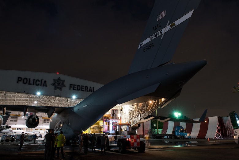 Equipment and medical supplies belonging to a U.S. Agency for International Development elite disaster team are offloaded from a Travis Air Force Base, Calif., Globemaster III at the Mexico City International Airport, Sept. 21, 2017. The team arrived in Mexico to support search and rescue efforts after a 7.1 magnitude earthquake struck the country.  (U.S. Air Force photo by Master Sgt. Joseph Swafford)