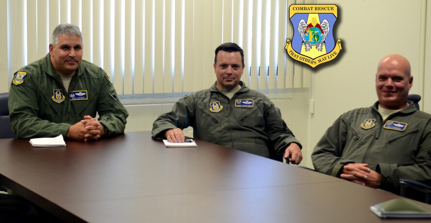 From left to right, Col. Michael LoForti, 920th Operations Group commander, together with Chief Master Sgt. Shane Smith, 920th OG superintendent and Lt. Col. Jeff Hannold, the groups’ mission commander, pose during a meeting to demonstrate how they rode out the historic Hurricane Irma Sept. 11, 2017, in Smith’s house while sitting around the chief’s dinner table, listening to roof shingles fly off the house, the three ensured the AF Reserve’s response to state and federal officials was ready to go the moment the storm passed. (U.S. Air Force photo/Maj.Cathleen Snow)